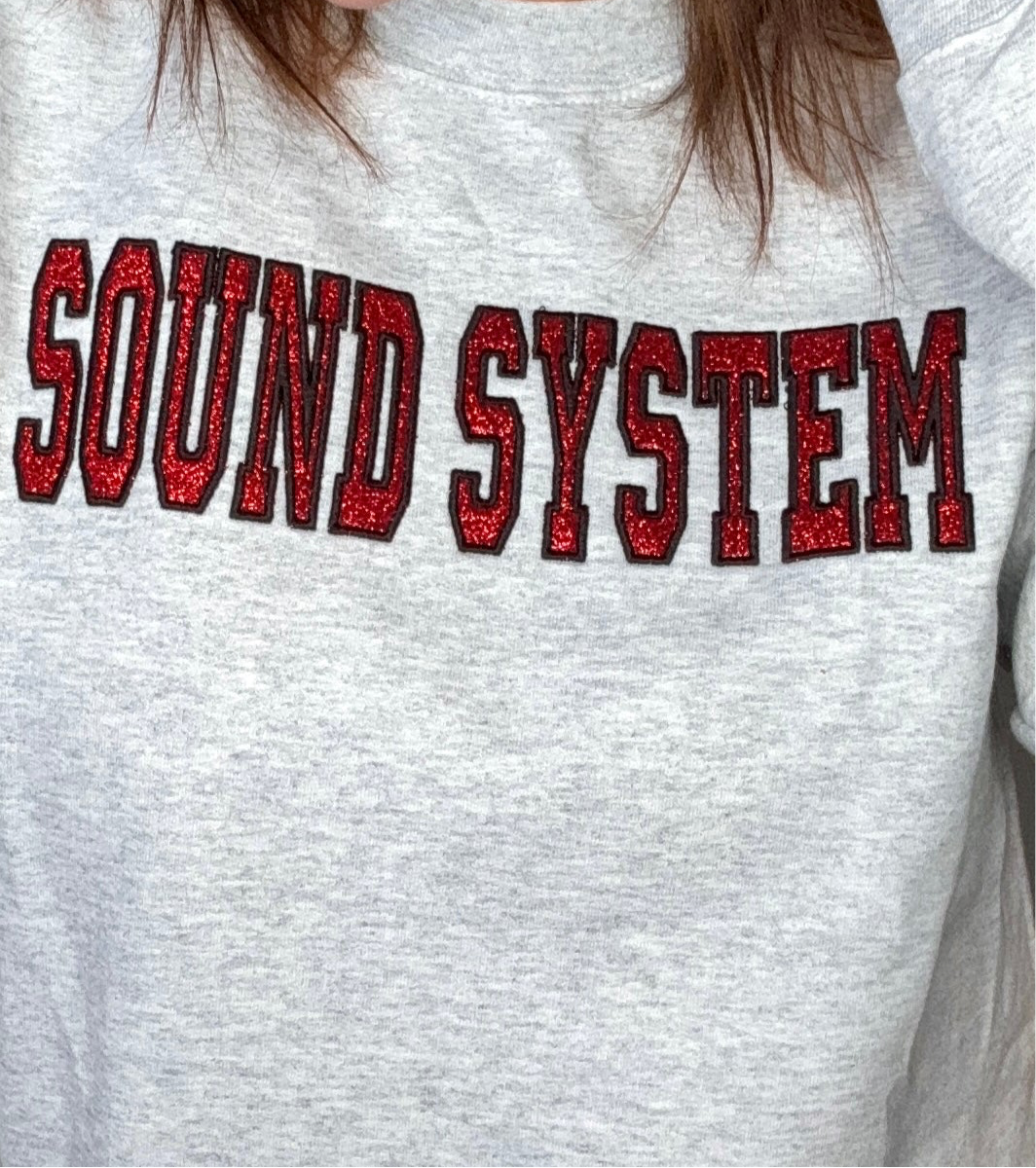 “Sound System” (with glitter in red)